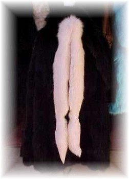White Fox Fur Scarf  Full Skin Fox Fur Scarf Width: ~4" Length: ~80" Padded Grosgrain Lining Fur Origin: Norway Manufacturing: USA White Fox Fur Scarf  Full Skin Fox Fur Scarf Width: ~4" Length: ~80" Padded Grosgrain Lining Fur Origin: Norway Manufacturing: USA