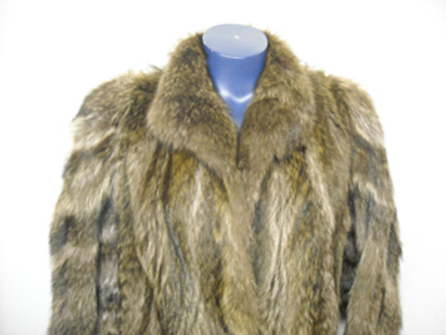 Vintage Full Skin Raccoon coat  Raccoon vintage Fur coat Stand Up Collar Stright Sleeves Size: Large Light, Very Warm & Comfortable Hook & Eye Closure Fur Origin: USA Manufacturing: USA Vintage is a Pre-Owned Or Estate Piece One Of a kind, From Our Fur Collections Shoulder To Shoulder: 18.5" Inside Crossback:15.5" Collar to Bottom: 47" Sweep:67" Neck to Sleeve: 29"