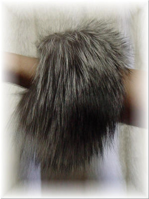 Natural Silver Fox Fur Cuffs Natural Silver Fox Fur Cuffs Genuine Fur Width: 3 Inches Fur Origin: Norway Manufactured: USA