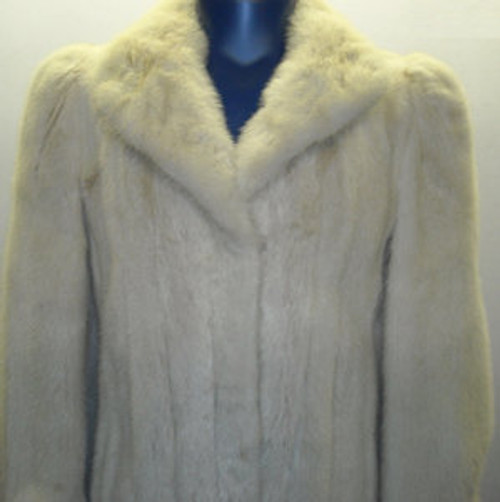 Vintage Full Skin White Mink Ladies Raccoon vintage Fur coat Stand Up Collar Straight Sleeves Size: Large Light, Very Warm and Comfortable Hook and Eye Closure Fur Origin: USA Manufacturing: USA Vintage is a Pre-Owned Or Estate Piece One Of a kind, From Our Fur Collections Shoulder To Shoulder: 17" Inside Cross back:14" Collar to Bottom:45" Sweep:56" Neck to Sleeve: 28"