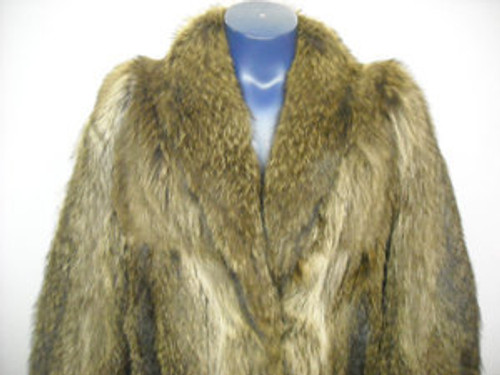 Vintage Full Skin Raccoon coat  Raccoon vintage Fur coat Stand Up Collar Stright Sleeves Size: Large Light, Very Warm & Comfortable Hook & Eye Closure Fur Origin: USA Manufacturing: USA Vintage is a Pre-Owned Or Estate Piece One Of a kind, From Our Fur Collections Shoulder To Shoulder: 18" Inside Crossback:15" Collar to Bottom: 49" Sweep:70" Neck to Sleeve: 32"