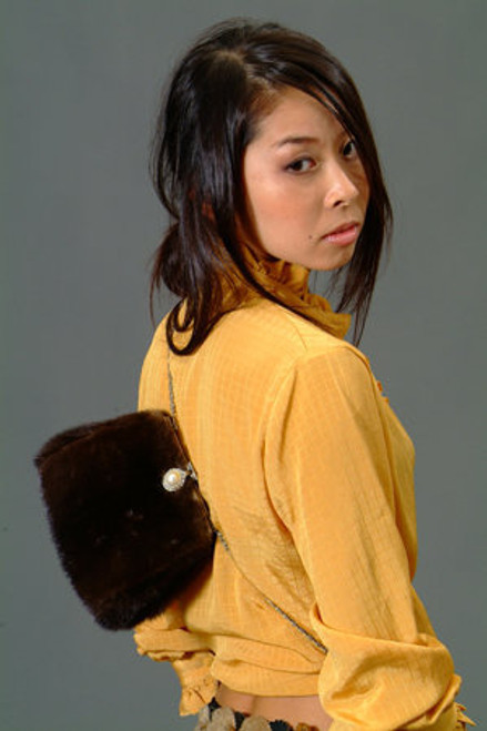 Mahogany Mink Fur  Clutch Bag  Mahogany Mink Clutch Fur Bag Full Skin Color Shown is Brown Snap Closure Fur Origin: USA Manufacturing: USA
