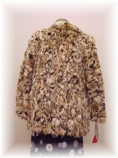 Lynx Sectional Fur Jacket  Sectional Fur Jacket Hook & Eye Closure Small Stand Up Collar Straight Sleeves Fur Origin: Canada Manufacturing: USA