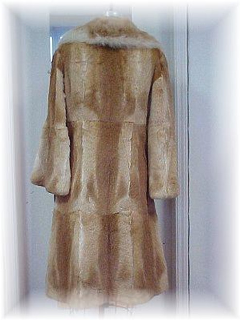 Full Skin Rabbit Design Fur Coat Manufacturing: USA Condition: Good Sex: Women's Crossback: 15" Sleeves: 28" Length: 43" Sweep: 76" Vintage is a Pre-Owned Or Estate Piece One Of a kind, From Our Fur Collections "Sold as Is" All Sales are Final