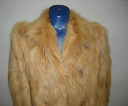 Vintage Golden Raccoon Pieces Coat Raccoon vintage Fur coat Stand Up Collar Stright Sleeves Size: Large Light, Very Warm and Comfortable Hook and Eye Closure Fur Origin: USA Manufacturing: USA Vintage is a Pre-Owned Or Estate Piece One Of a kind, From Our Fur Collections Shoulder To Shoulder: 20" Inside Crossback:17" Collar to Bottom: 50" Sweep: 76" Neck to Sleeve: 31"