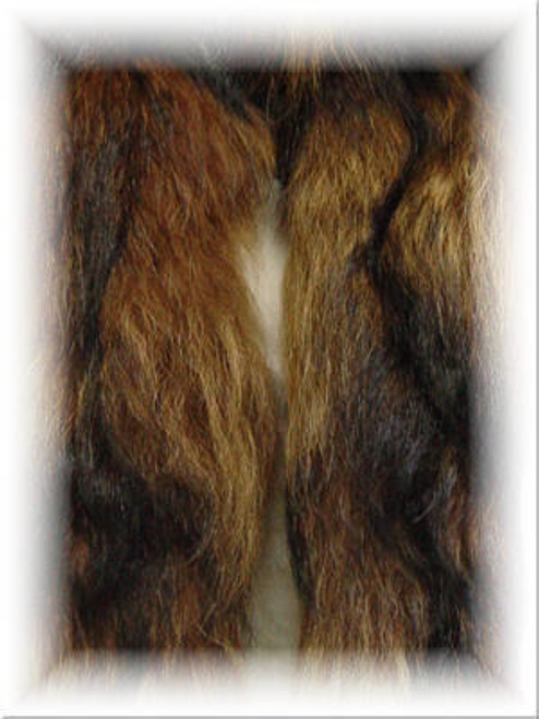 Tanuki Fur Scarf  Tanuki Fur Scarf Width: 4 Inches Length: 60 Inches Plus Width: ~4" Luxurious, Fun Fur Fur Origin: Norway Manufactured: USA