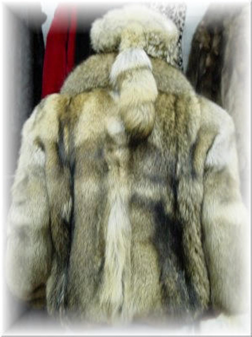 Full Skin Coyote Fur Jacket  Coyote Fur Jacket Full Skin Elastic Waist Elastic sleeves and waist Zip Front Closure Zipper Closure Daniel Boone Hat (Optional) Detachable Hood (Optional) Fur Origin: USA Manufactured: USA