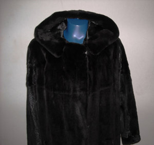 Full Skin Sheared Mink Ladies Raccoon vintage Fur coat Stand Up Collar Stright Sleeves Size: Large Light, Very Warm and Comfortable Hook and Eye Closure Fur Origin: USA Manufacturing: USA Vintage is a Pre-Owned Or Estate Piece One Of a kind, From Our Fur Collections Shoulder To Shoulder: 20" Inside Crossback:17" Collar to Bottom:52" Sweep:70" Neck to Sleeve: 34"
