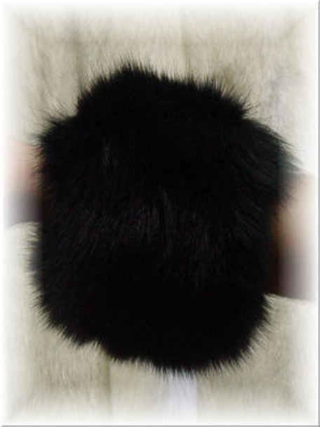 Dyed Black Fur Cuffs Black Fox Fur Cuffs Width: ~3 inches" Item Sold Per Pair Velcro Closure Color Show Dyed Black Fur Origin: Norway Manufacturing: USA