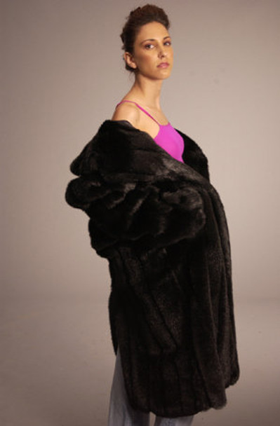 Black Faux Fur Coat Faux Fur Coat Length 49" Shawl Fur Collar Shown Color Shown Is Black Hook and Eye Closure Choice of Color Cuff Shown Is Straight Cuff Manufacturing: USA