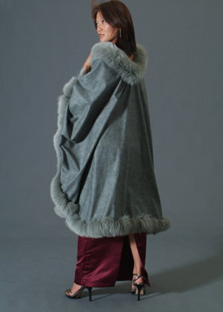 Light Green Cape with Fox Tail Trim Green Cape Trimmed with Fox One Size Fits All Cashmere / Wool Blend Fur Origin: Norway Manufacturing: USA