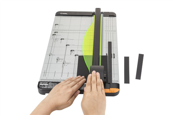 CARL Dc-600 Paper Trimmer, cuts up to 20 sheets, A4 size, model 700600, precise and durable.