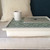blithe green lap tray with cream frame and ipad and coffee cup on top of it