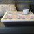 cheery lap tray with cream frame  with a coffee cup on top of it