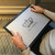 her ladyship faux 4 black lap tray with black frame pictured on a woman's lap