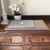 Arabesque lap tray with wood frame pictured with laptop on top of it