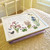 Spring garden kiss of the sun lap tray with cream frame and lilac cushion