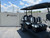 ICON i60L 6 Passenger Lifted Black Golf Cart