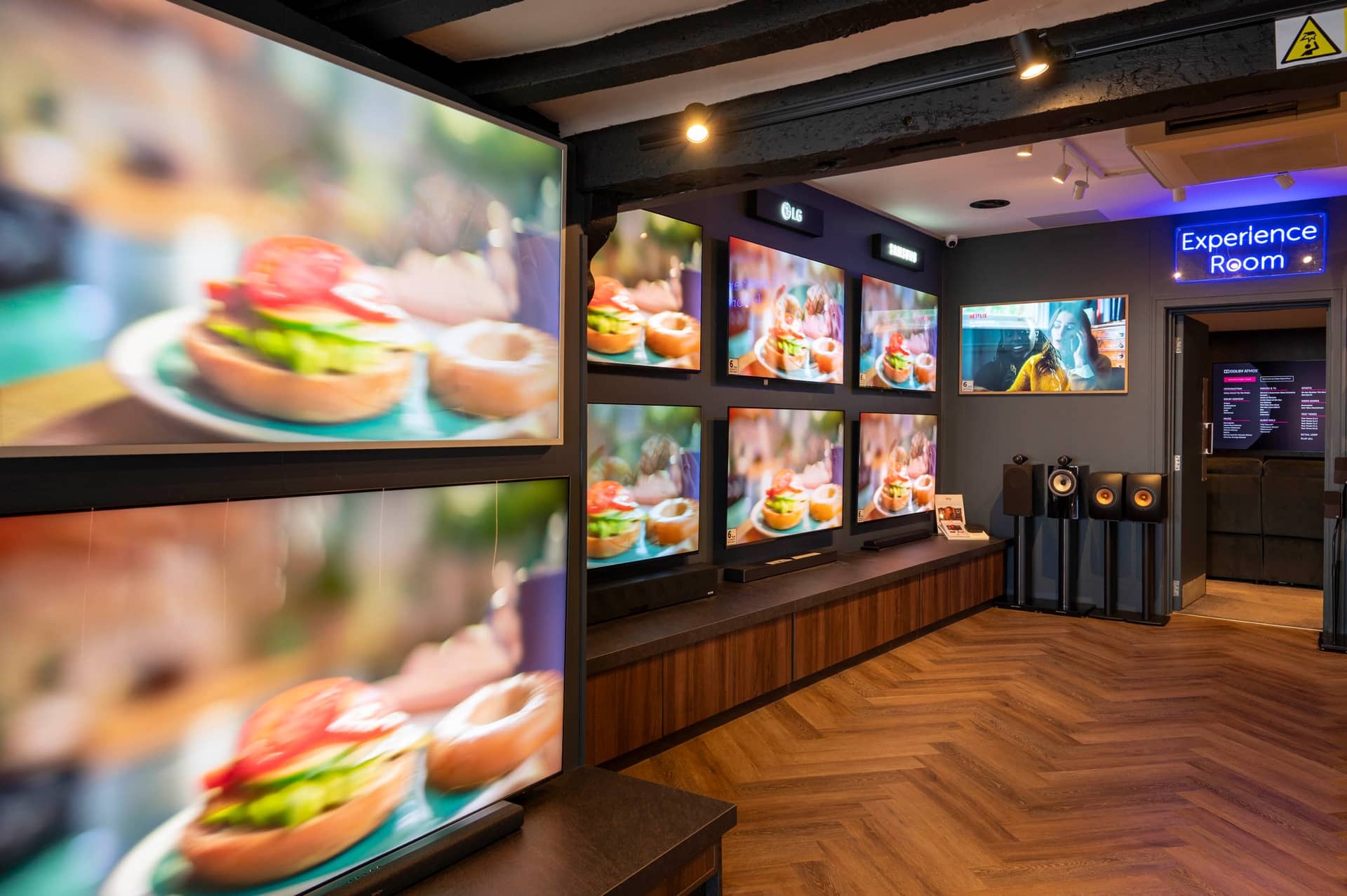 Reigate interior showing TV wall and entrance to Experience Room