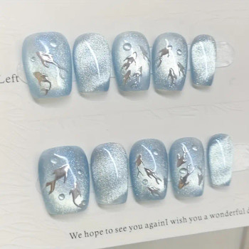 blue cat eye press on nails with silver koi fish accents blue cat eye press on nails with silver koi fish accents