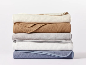 Organic Woven Honeycomb (formerly Jacquard) Blanket in beautiful rich colors by Coyuchi. This is a superbly textured blanket, medium weight but solid, not waffled. Organic Woven Honeycomb (formerly Jacquard) Blanket in beautiful rich colors by Coyuchi. This is a superbly textured blanket, medium weight but solid, not waffled.
