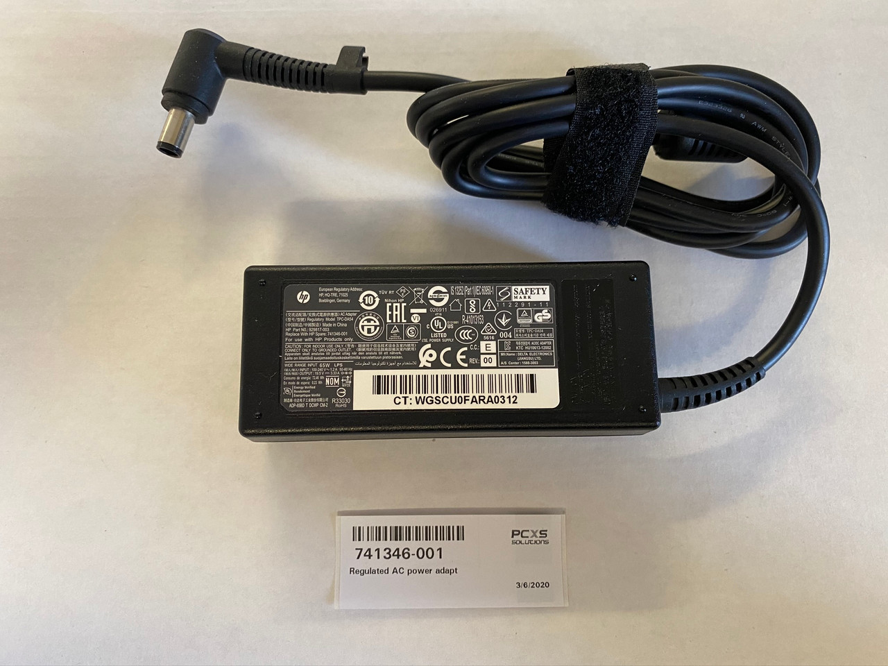 HP Regulated AC power adapter - Rated at 65 Watts, 87% max