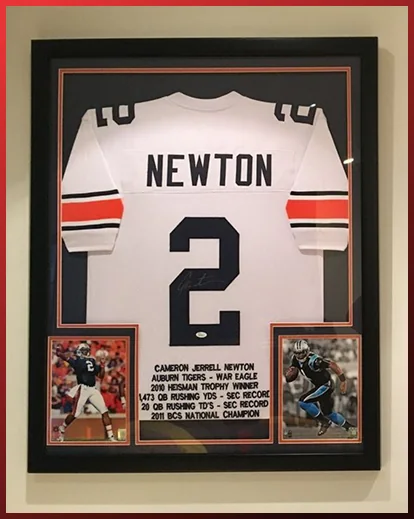 Framed Cam Newton Auburn jersey with photographs