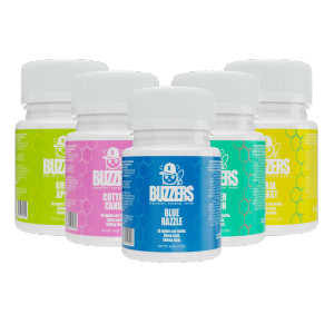 Buzzers tabs collection lineup with multiple flavors (Green Apple, Cotton Candy, Blue Razzle, Water Melon, Baja Blast, plus a partially visible red-labeled variant); 10 tablets per bottle, 50mg each (500mg total). Premium, high-quality Buzzers tabs for sale—buy online