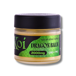 Front view of Koi CBD Dragon Balm jar showing 2000mg CBD and THC full-spectrum topical Front view of Koi CBD Dragon Balm jar showing 2000mg CBD and THC full-spectrum topical