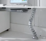 Close up of Valde Reception Desk optional Horizontal Cable Tray & Vertical Cable Duct by MDD