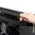 Hand lifting top panel showing access to top vents.