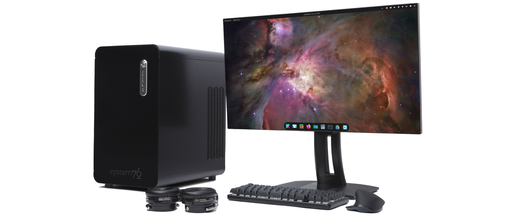 Thelio linux desktop on desk with monitor featuring Pop!_OS, and a Launch Keyboard