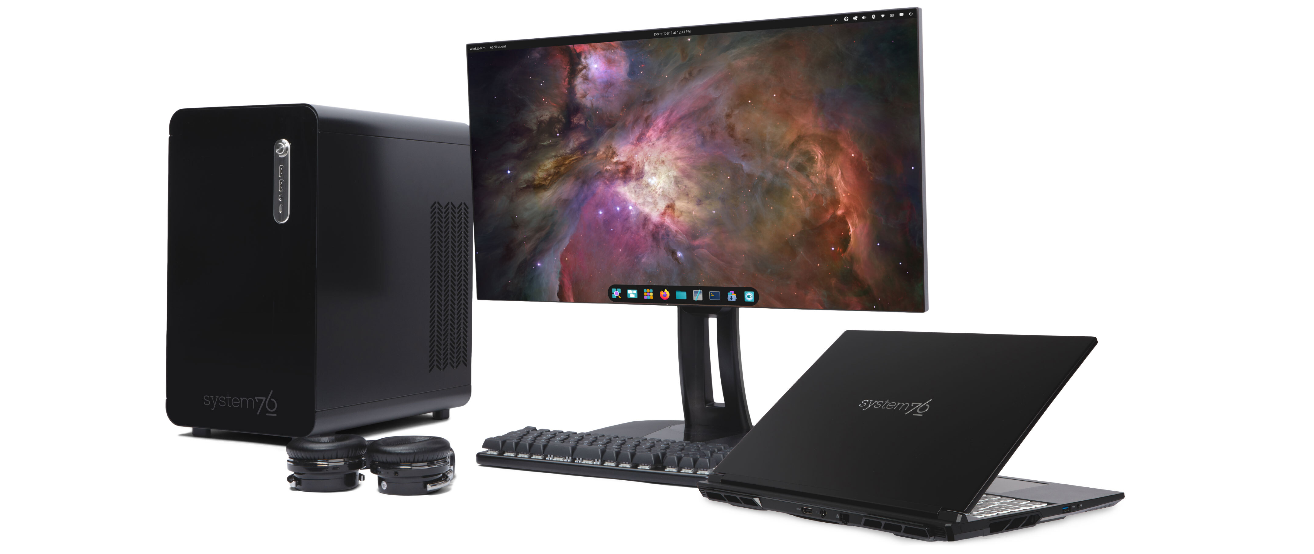 Thelio linux workstation and laptop workstation on desk with monitor featuring Pop!_OS, and a Launch Keyboard