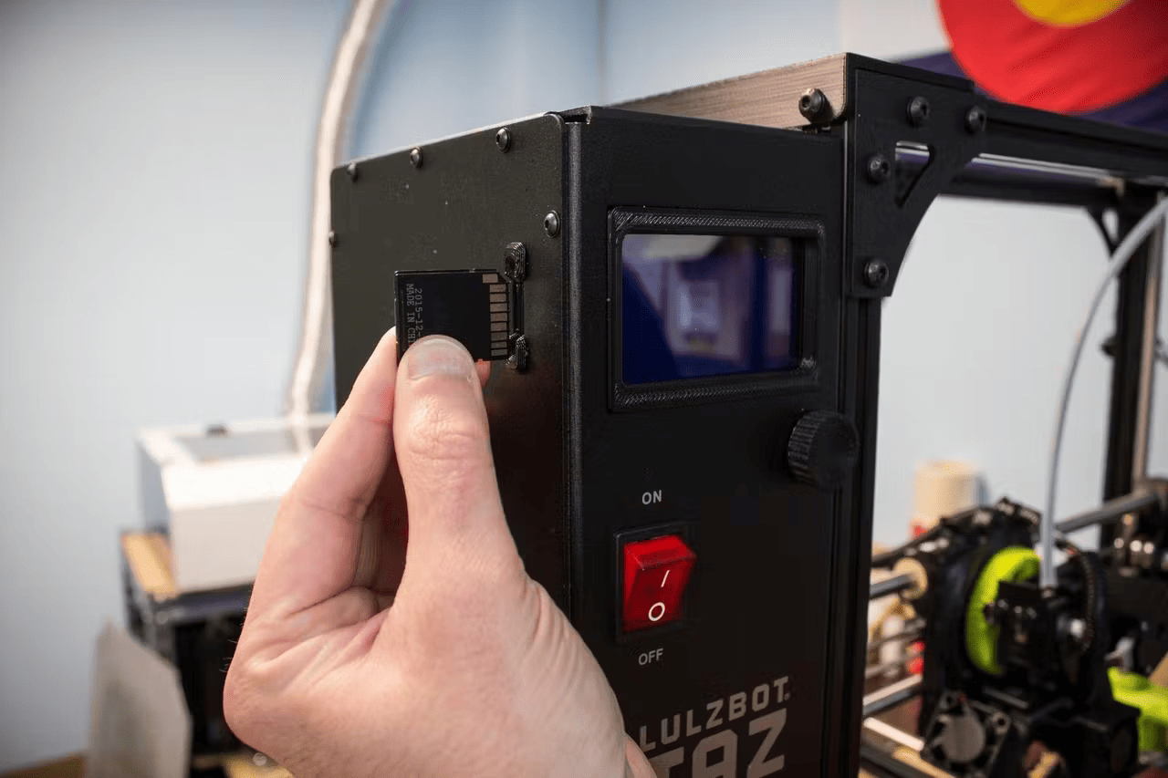 photo of adding an SD card into Lulzbot 3d printer