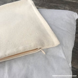 Plain cotton pillow case pictured with poly insert.