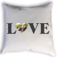 Show a little love to someone special with this custom love pillow. Complete with a heart shaped photo of your choice, this personalized pillow is a great addition to your family room, bedroom, or even a nursery or kid's room!