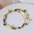 Tory Burch Black and Gold Bead Logo Necklace