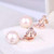 Tory Burch Rose Gold Pink Pearl Round Logo Drop Earrings on Card