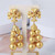 Tory Burch Roxanne Carved Gold Tassel Crystal Drop Earrings - Clip on, Post back