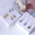 Michael Kors MK Logo Circle Gold Hook Drop Earrings w/ Gift Box Luxe Galaxy