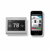 Honeywell thermostat with the app on a phone