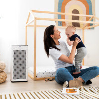 White Air Purifier in nursery with Mom and baby