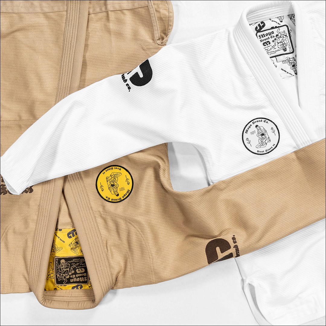 Comparison chart of top 10 best jiu jitsu gi with weight, material, price, and pros