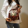 Embossed Leather Saddle Bag: Vintage Western Style, Adjustable Strap
