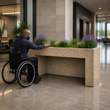 A man in wheel chair accessing ADA-Friendly Rustic Fiberstone Raised Garden Planter in a corporate lobby