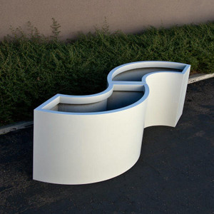 Segments of a fiberglass curved planter Segments of a fiberglass curved planter