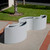 Radius Curve Fiberglass 1/3 Circle Commercial Planters arranged like a wave