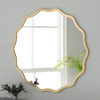 Scalloped round mirror in gold