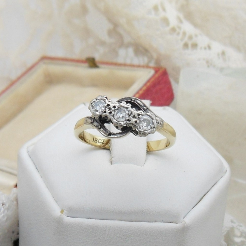 41942 Vintage stone diamond crossover ring marked 18ct PLAT size