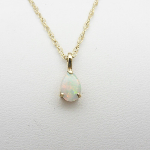 9ct yellow gold pear shaped opal pendant on 18.5" twist link chain marked 375